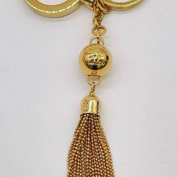 Auth Louis Vuitton Portecle Gold Color
Key Ring/Holder W/Box - Picture 10 of 10